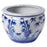 Blue and white ceramic pot with bamboo and crane design on a white background