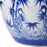 Ceramic vase with blue crane and bamboo design on a white background