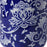 Blue ceramic vase with white floral patterns