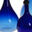 Set of Three Blue Glass Bottles